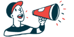 A person wearing a baseball cap speaks using a megaphone.